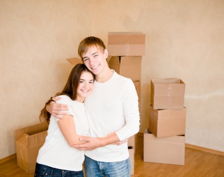 Local removals team handling a move in a Mayfair street